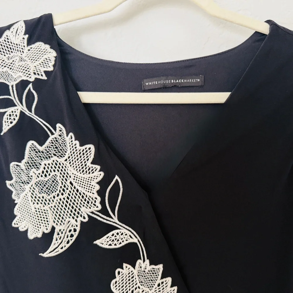Black Sleeveless Top with White Floral Embroidery - Picture 2 of 6